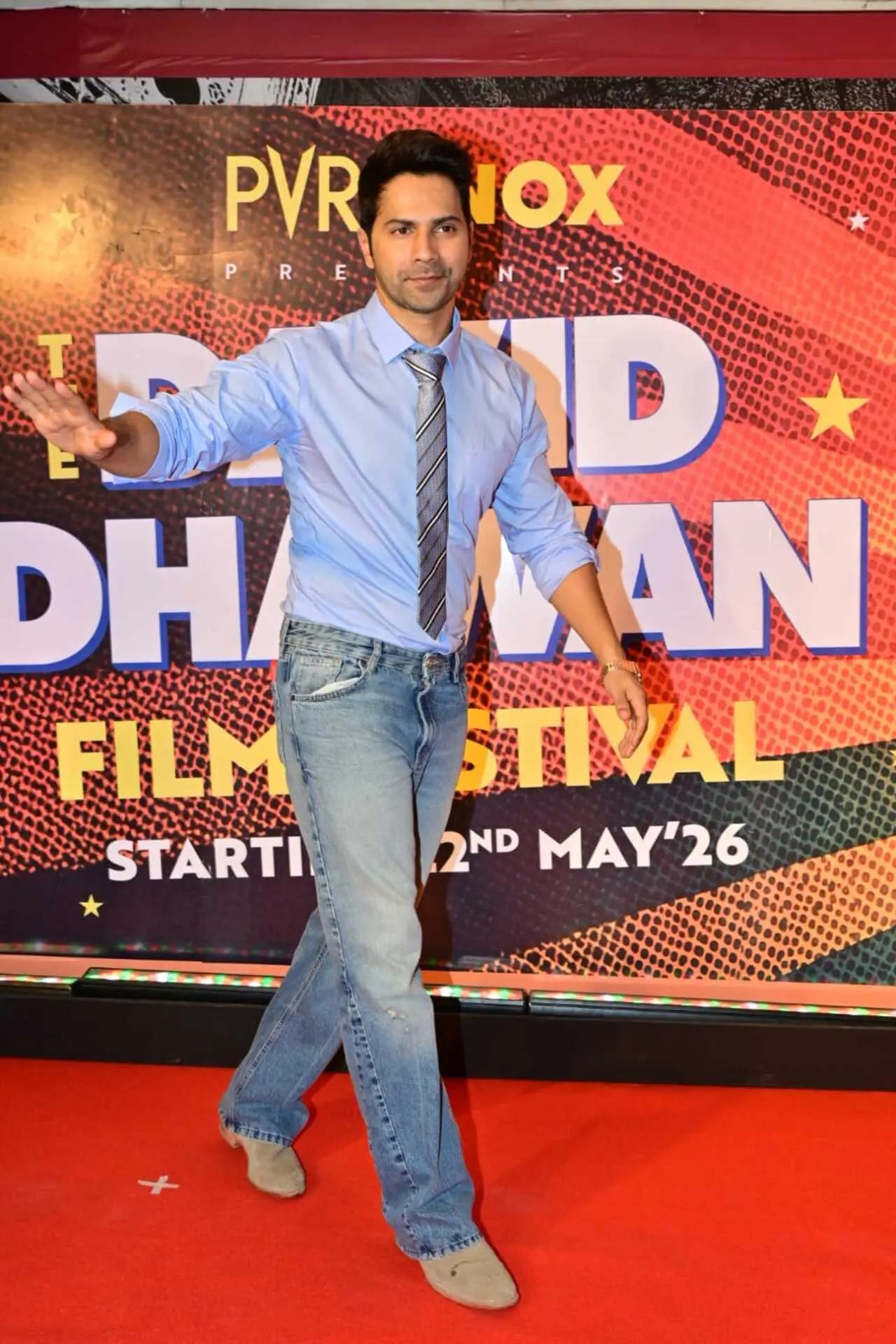 Varun Dhawan arrived in a blue shirt with a denim and a tie for the David Dhawan film festival. Varun Dhawan arrived in a blue shirt with a denim and a tie for the David Dhawan film festival.